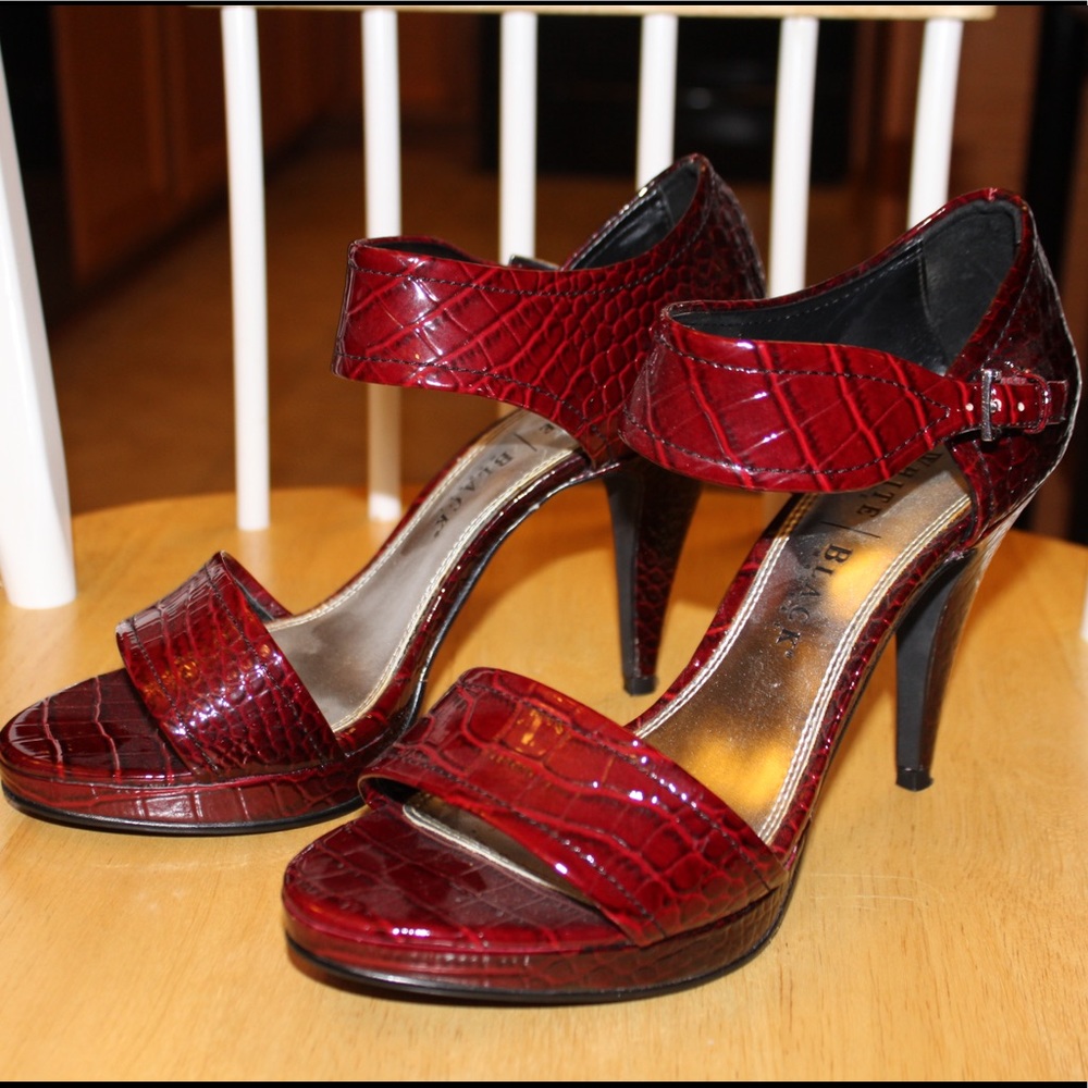 Red snake skin high heels